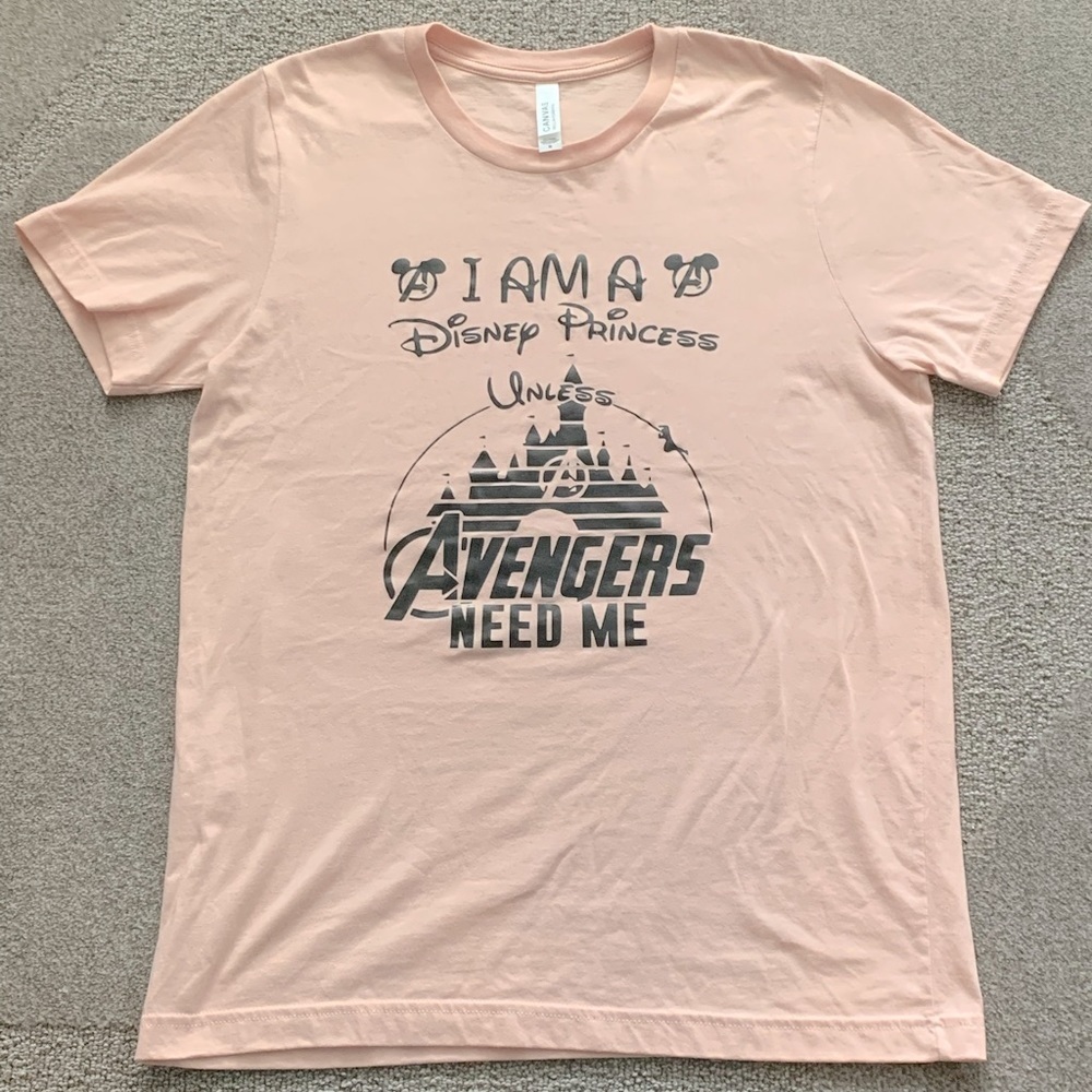 Disney Princess & Avenger Lovers.  Peachy colored short sleeve tee shirt.